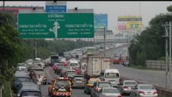 cars parked on overpasses bangkok floods