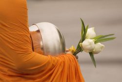 monk with flowers