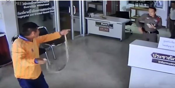 man attacked by snake police station Thailand